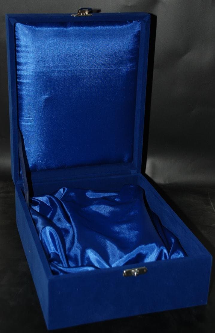 Open blue velvet box with an upright lid and gathered blue satin-like lining