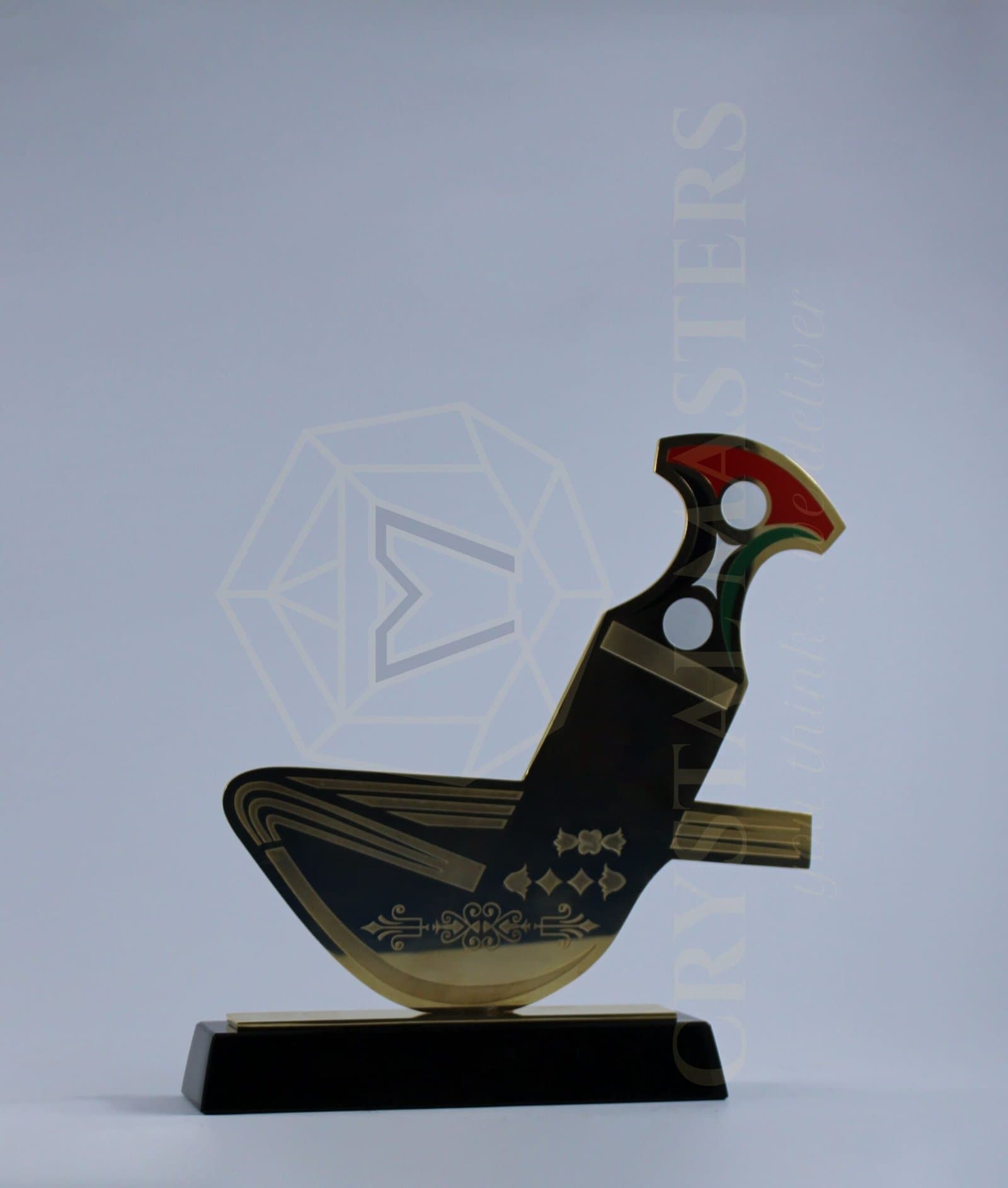 Curved dark heritage award with gold-toned ornament, red-green upper details and a black base