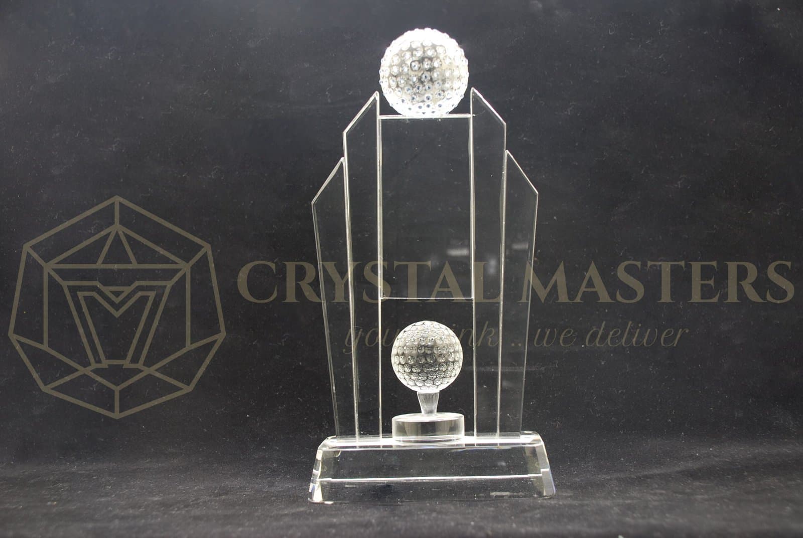 Tall clear golf award with a large upper ball, lower round detail and stepped transparent base