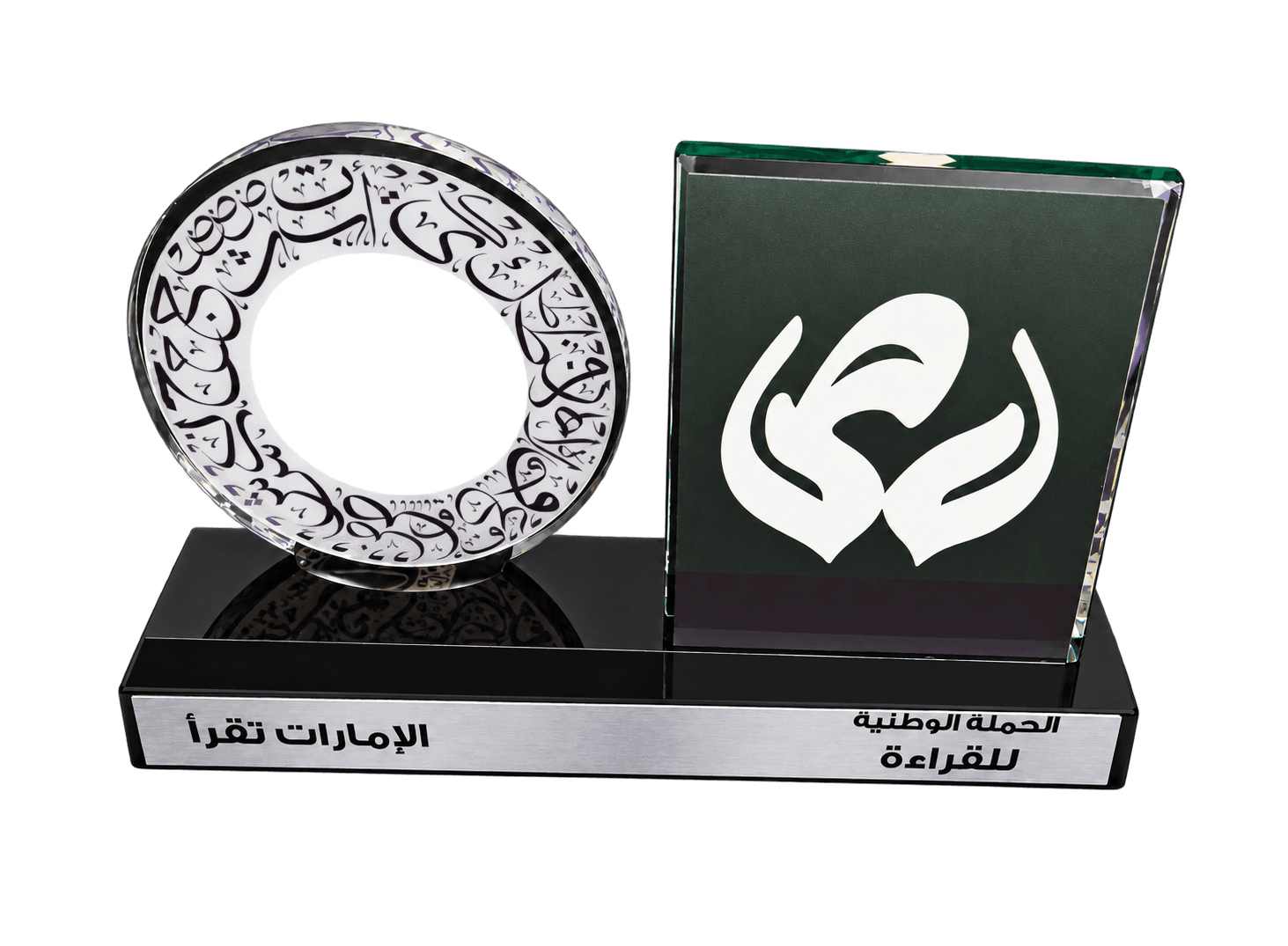 Circular decorative award face beside a bold white reading motif on a black base inside a case