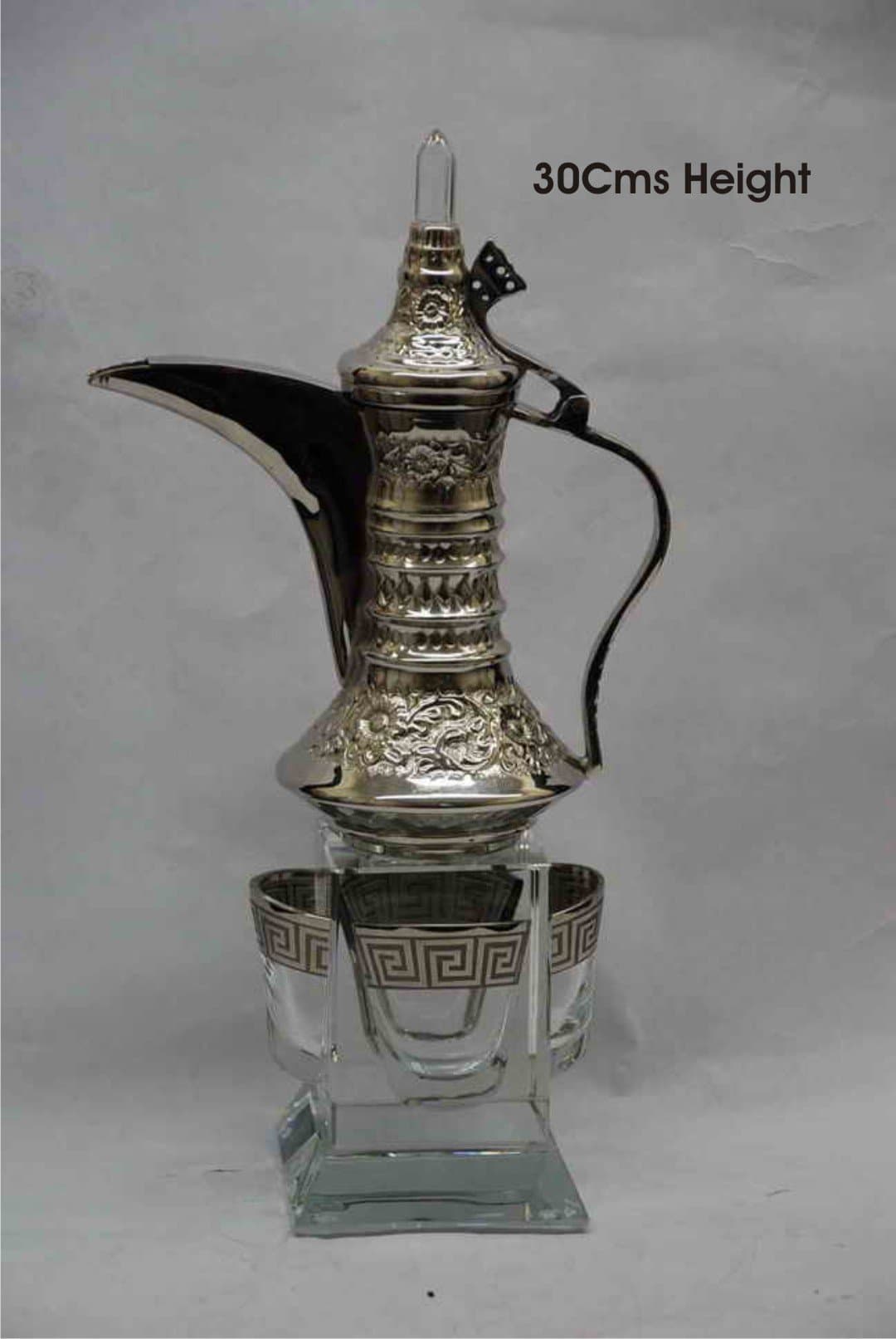 Ornamented silver-toned Dallah with a long curved spout, loop handle and clear supporting foot